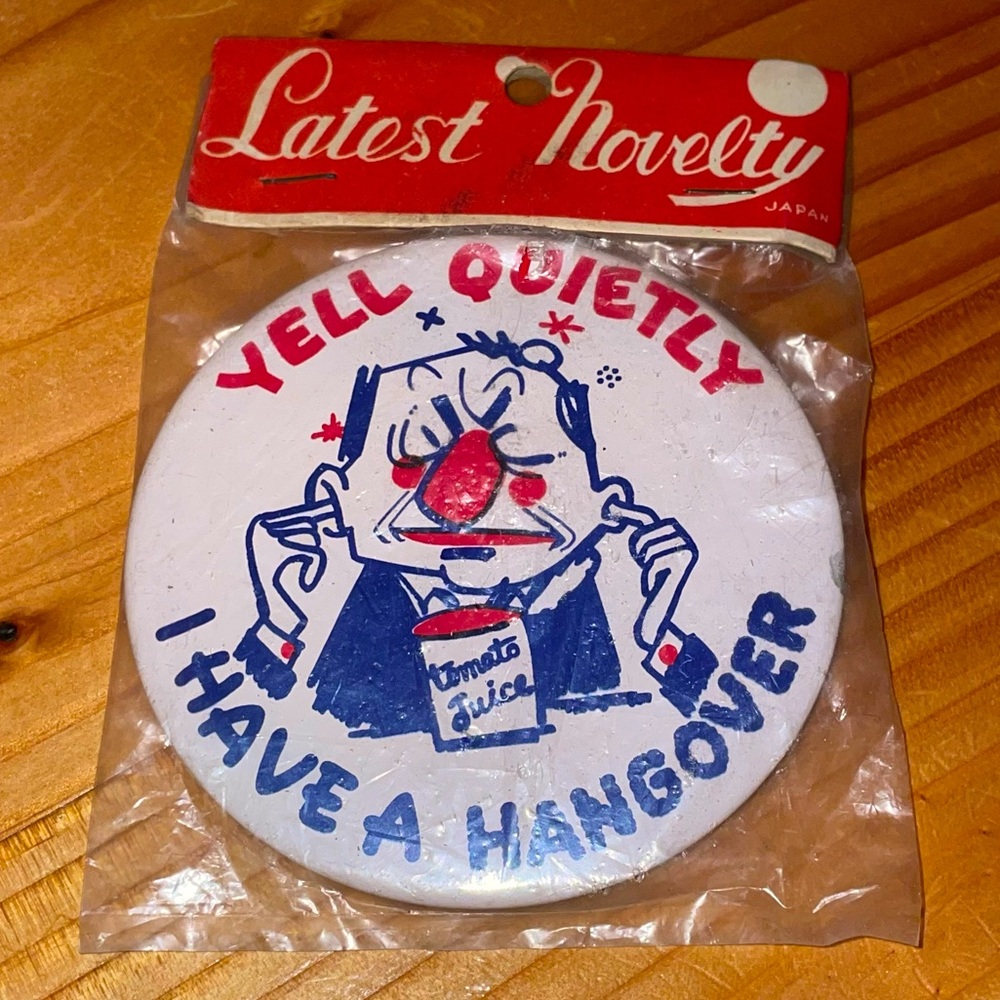 VINTAGE PINBACK LATEST NOVELTY - Yell Quietly I Have A Hangover - Made In Japan